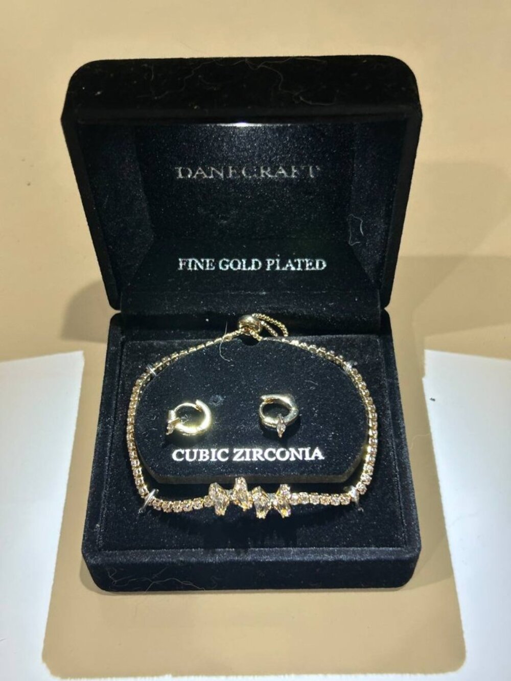 Gold-plated CZ tennis bracelet + huggie hoop earrings set